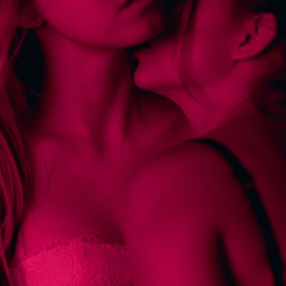 lesbians kissing in bras