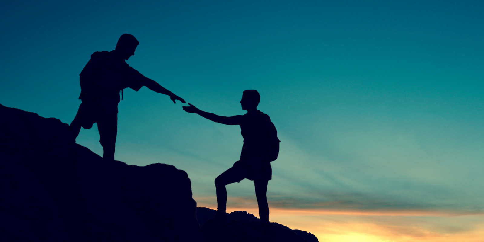 Enlisting help from others climbing a mountain