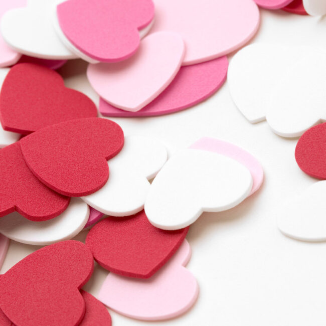 felt cutouts of pink white and read hearts