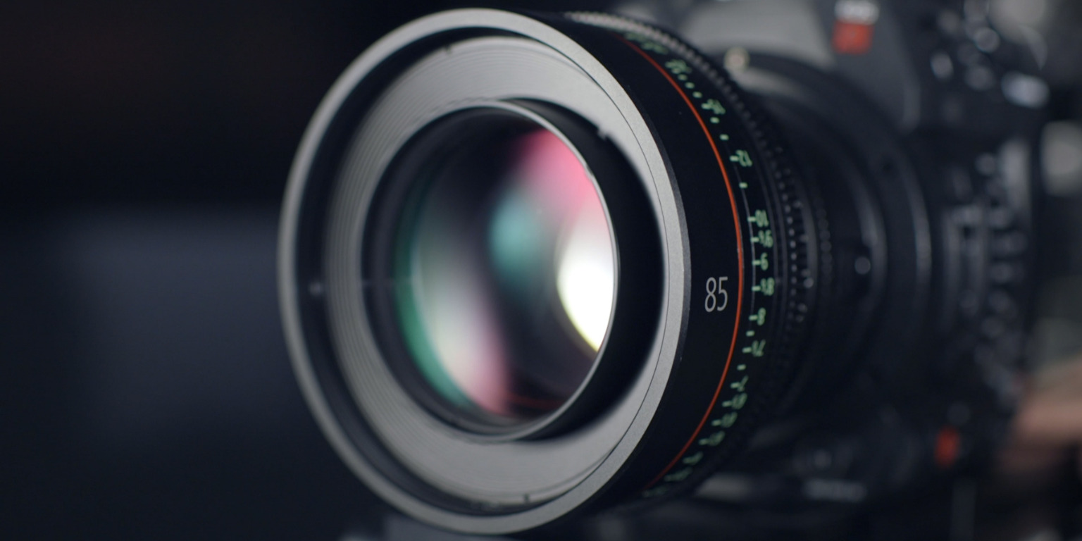 Close up of camera lens capturing content