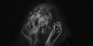 woman screaming in black and white photo