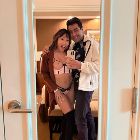 mirror selfie with couple, nude woman