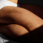 Male in bed with white underwear