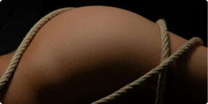 naked body with rope around it